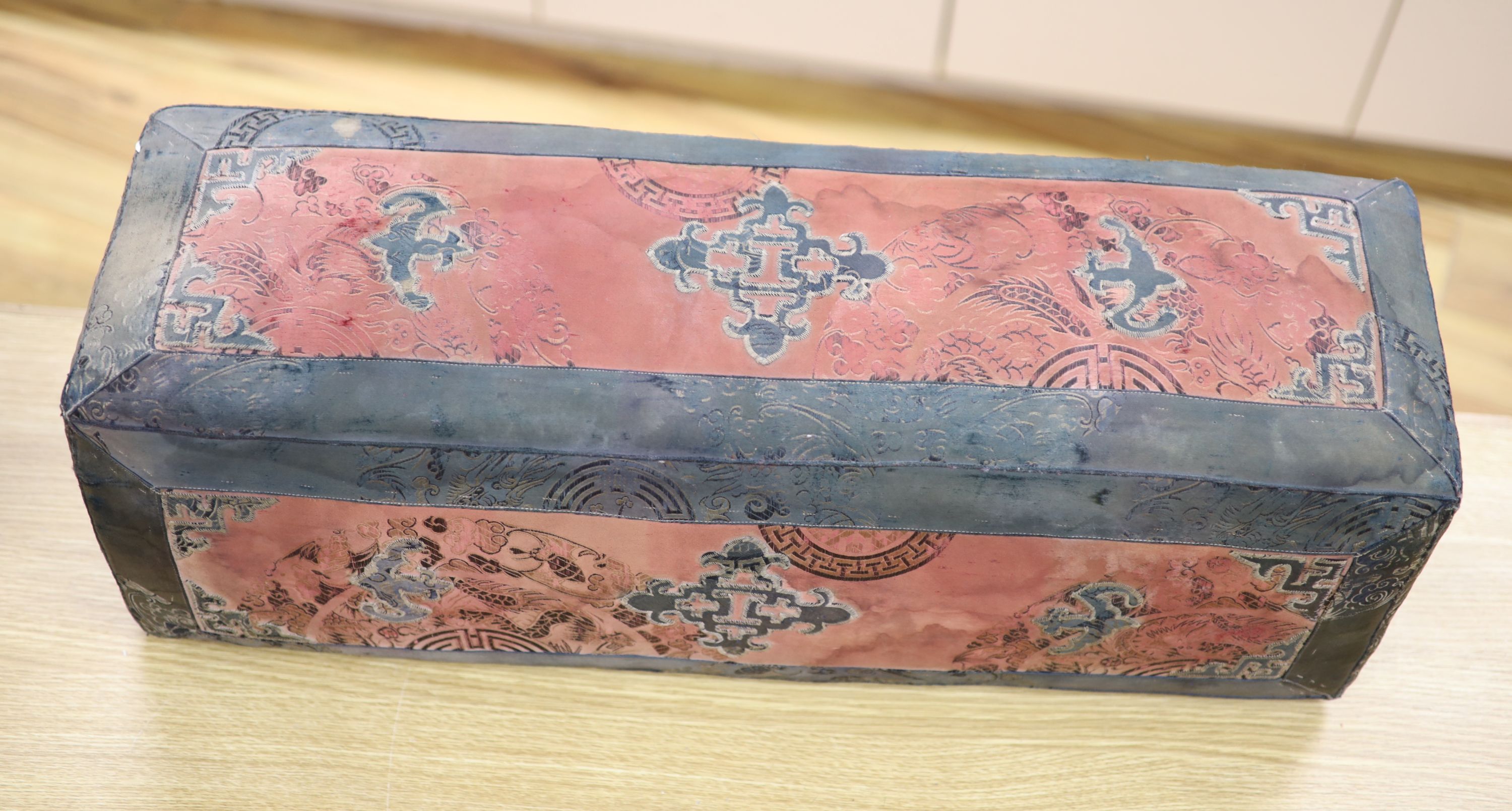 A 19th century Mongolian silk brocade and embroidered arm rest, length 73cm